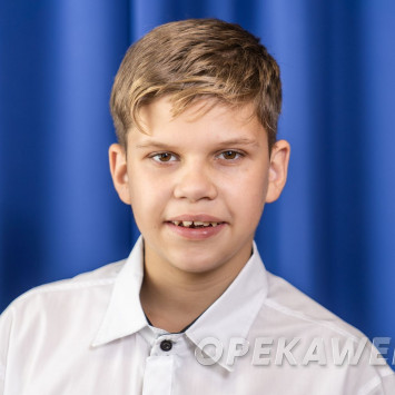 Николай